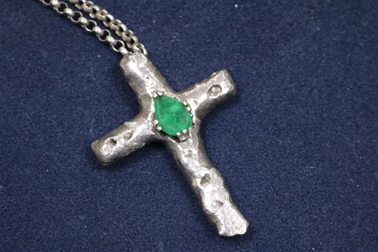 A 1970s white metal and emerald set cross pendant, on a silver belcher link chain, pendant 65mm.